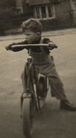 [Then: me as a child on a scooter]