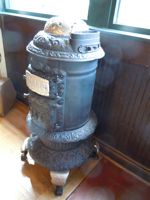 [potbelly stove, heater]