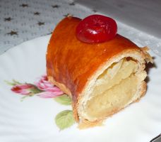 [a piece of puff pastry with almond paste]