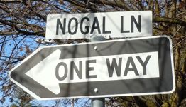 ['Nogal Lane' street sign]