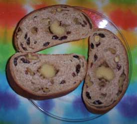 ['Stollen:' Christmas or Easter bread: raisin bread 
  with almond paste]